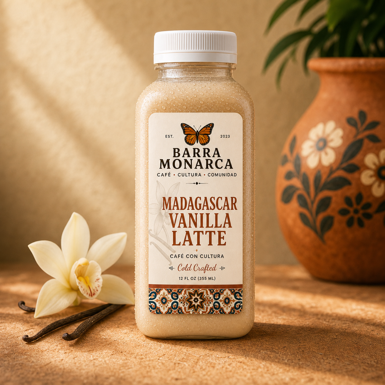 Chilled Barra Monarca Madagascar Vanilla Latte bottle with vanilla orchid and beans